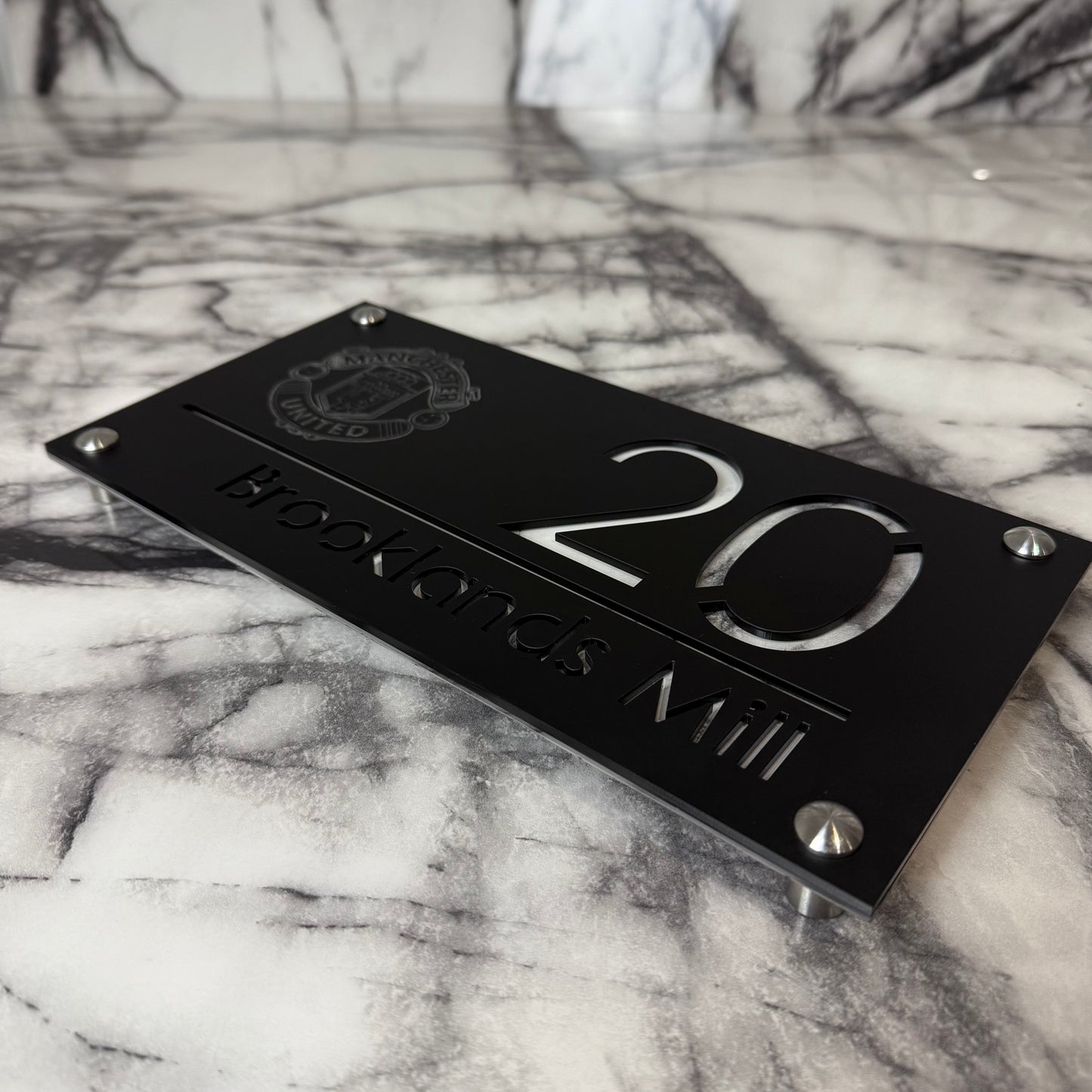 Personalised Matte Black Acrylic Front Door Sign – Custom House Number & Street Name with Manchester United Badge Engraving and Custom Backplate Selection (Copy)